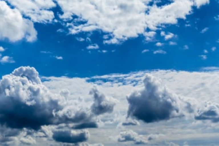 A factsheet cover for Essential Climate Variable (ECV) on clouds, featuring a sky full of clouds and logos of related climate organizations.
