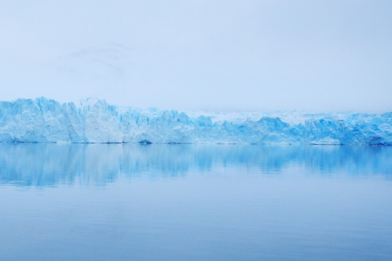 A factsheet cover titled "Ice Sheets and Ice Shelves" with logos of global climate organizations, against a background of an ice sheet and calm water.
