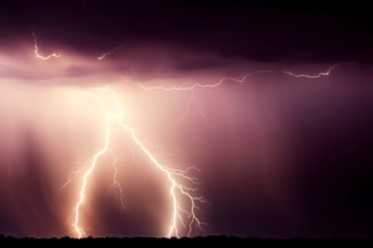 Lightning bolts illuminate a dark sky next to a banner displaying the "Essential Climate Variable (ECV) Factsheet" by the Global Climate Observing System.