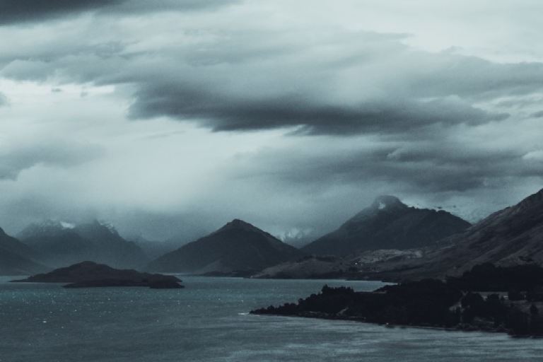 Banner titled "Surface Pressure Essential Climate Variable (ECV) Factsheet" featuring a stormy lake landscape. UN and related organization logos are included.