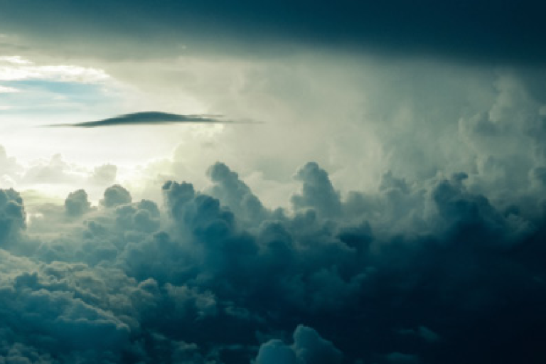 Cloudy sky scenery with a factsheet titled "Upper-air Water Vapour: Essential Climate Variable (ECV) Factsheet" and logos of Global Climate Observing System, WMO, IOC, ISC, UNE, and UN.