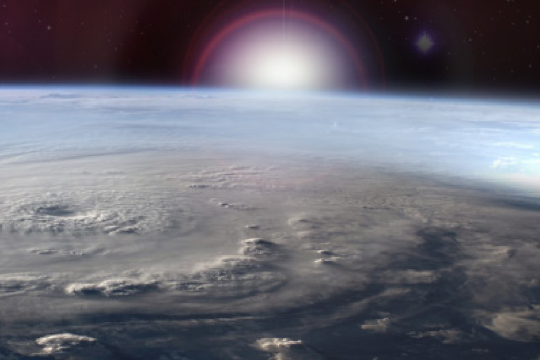 A global climate observing system factsheet on upper-air wind speed and direction, featuring an image of a swirling storm on Earth as seen from space.